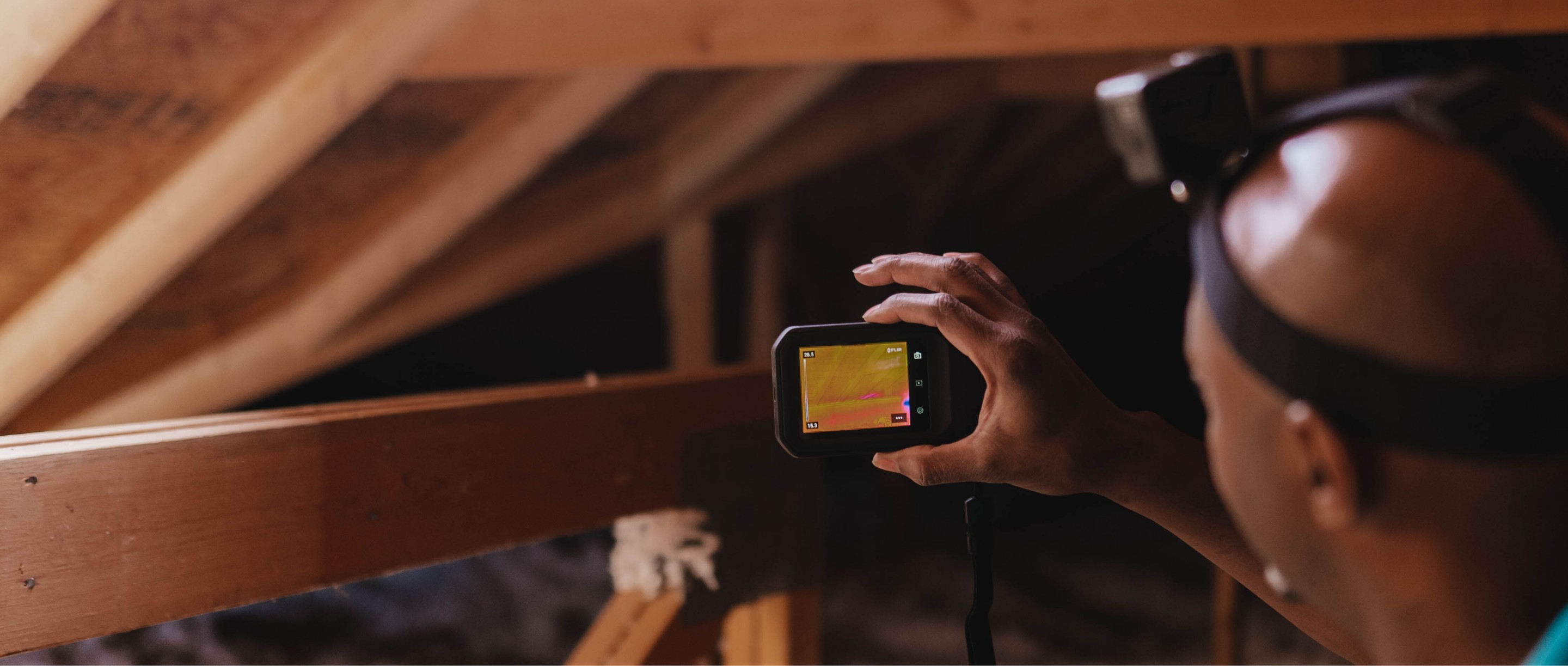 iFOAM technician scanning the attic