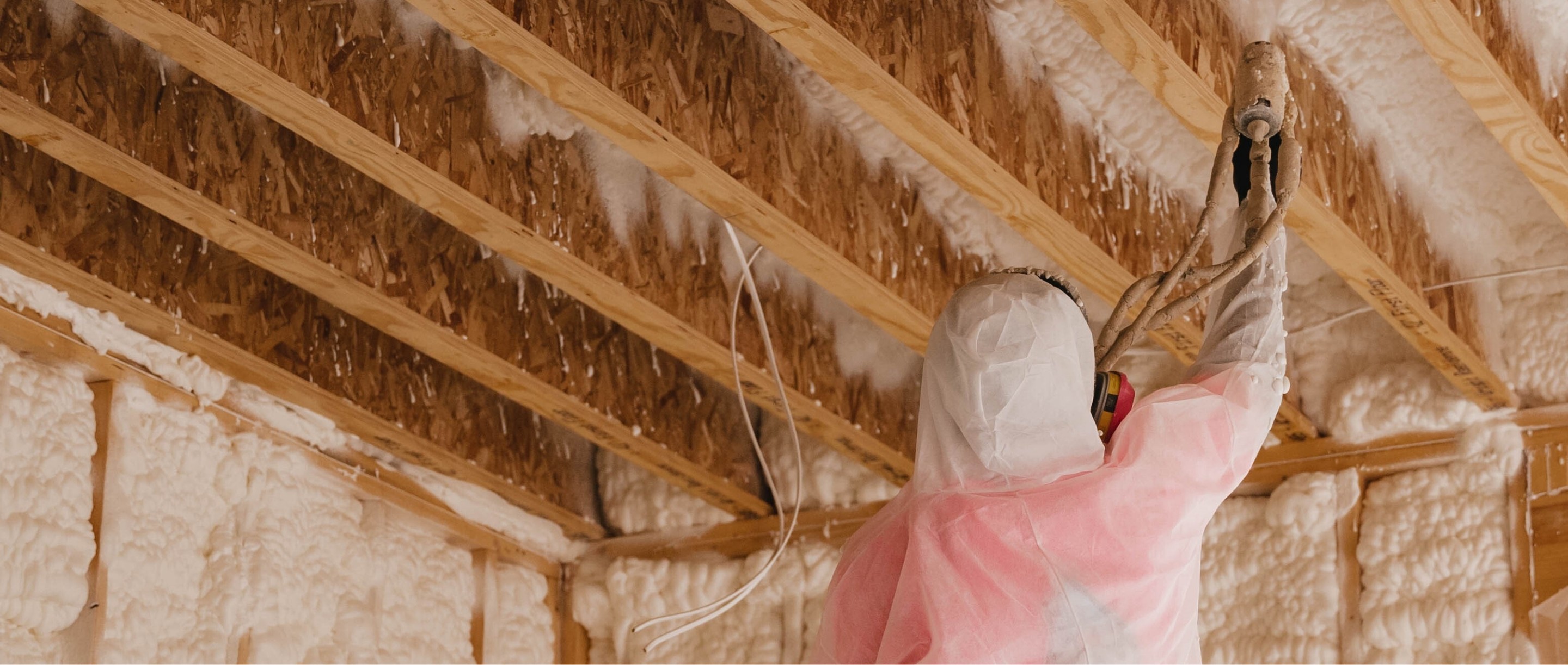 iFOAM technician spray form in the ceiling