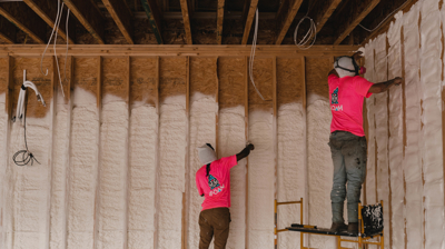 iFOAM technicians installing spray foam insulation